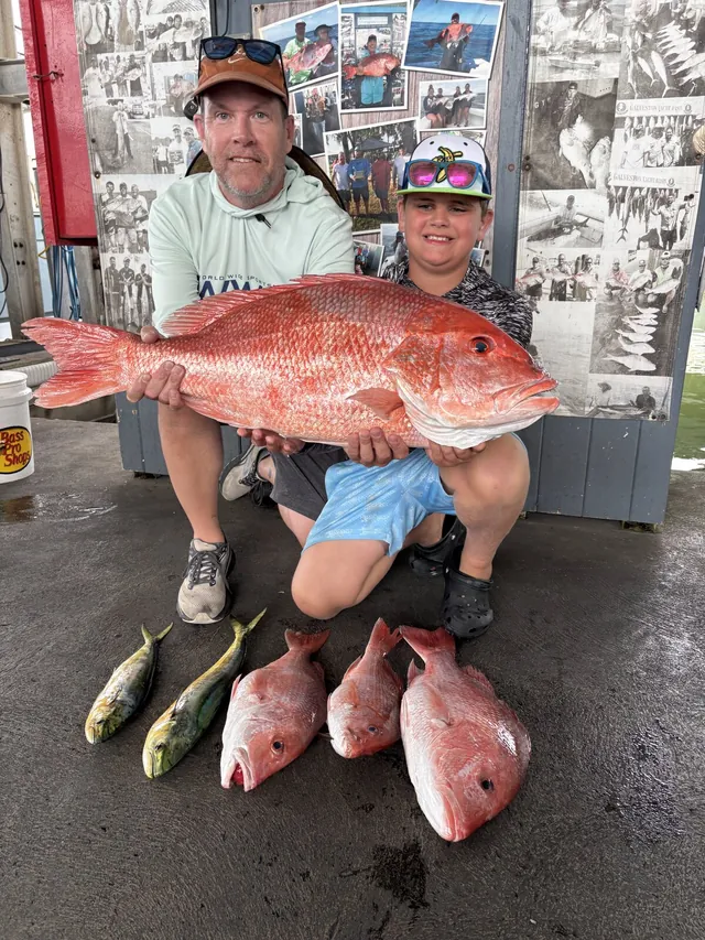 Anglers at the Galveston Offshore dock with red snapper and mahi mahi from a federal offshore charter