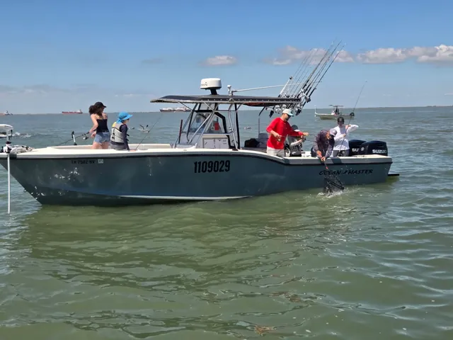 A family aboard the Half Time on a private Galveston charter trip